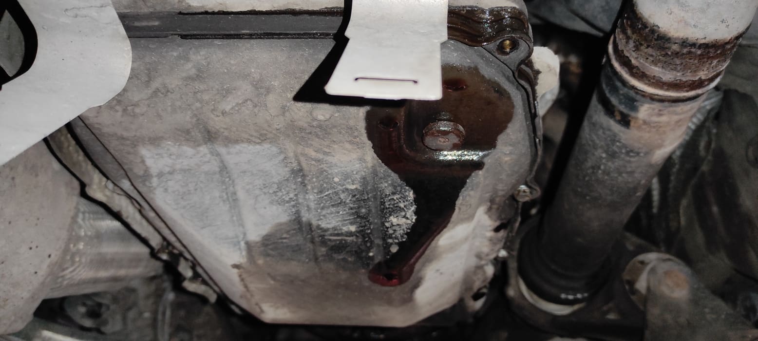 Устанавливаем поддон АКПП обратно.