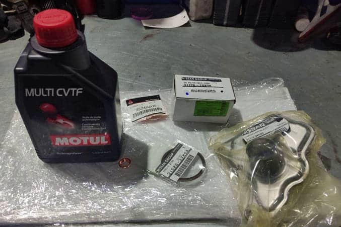 Комплект необходимых расходников для работы, что ещё понадобится (кроме масла) для проведения замены.